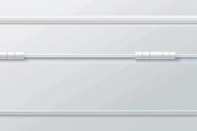 A close-up photo of an exposed fiber optic cable neatly concealed within a white cable management molding strip along a wall.